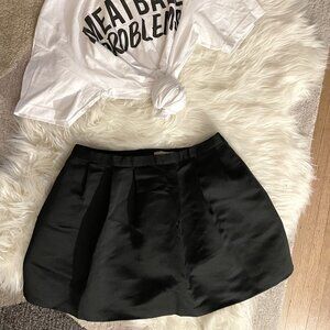 Forever 21 black mini skirt with pleats, pockets. Size 28 fits small/medium